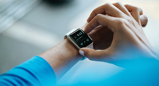 Picture of a person checking a Smartwatch